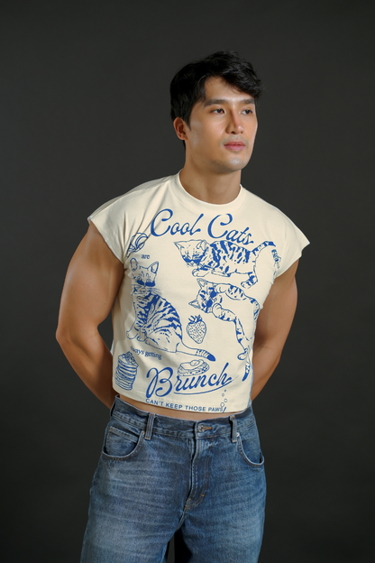 Man wearing a t-shirt with graphic design and text against a dark background